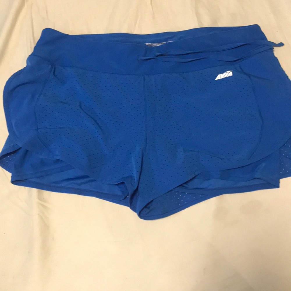 Blue elastic shorts with mesh material covering